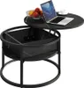 A black and white marble-patterned lift-top coffee table with a laptop, fruit bowl, and coffee cup on the top surface. Anteprima dell’immagine prodotto