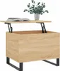 A lift-top coffee table with a wood-grain finish and black metal legs, shown with a book and a vase of greenery on its surface. Produktbild-Vorschau