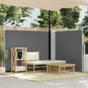 An outdoor patio scene with a retractable side awning, lounge furniture, and a small wooden shelf. Anteprima dell’immagine prodotto