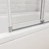 Close-up view of a shower screen attached to a bathtub. Produktbild-Vorschau