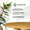 A plant and a round wooden table are shown against a light background with text describing product features. Produktbild-Vorschau