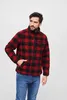 A man wearing a red and black plaid fleece jacket and blue jeans, standing against a white background. Produktbild-Vorschau