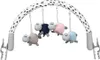 A baby gym arch with four hanging sheep toys. Produktbild-Vorschau