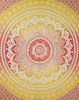 A close-up view of a mandala tapestry with a gradient of red and yellow. Voir les images du produit