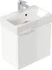 A white bathroom vanity with a sink and faucet. Produktbild-Vorschau