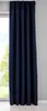 A dark blue curtain hanging in front of a window. Produktbild-Vorschau