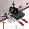A jig for drilling holes for concealed door hinges is shown on a wooden surface. Produktbild-Vorschau
