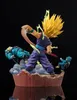 A dynamic action scene from Dragon Ball Z, featuring a Super Saiyan 2 Gohan figure in mid-attack, with defeated Cell figures on the base. Produktbild-Vorschau