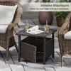 An outdoor patio scene with wicker chairs and a small table. Podgląd zdjęcia produktu