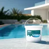 A bucket of pool chemicals is placed on the edge of a swimming pool. Produktbild-Vorschau