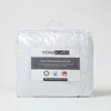 A white mattress protector is shown in its clear plastic packaging against a white background. Anteprima dell’immagine prodotto