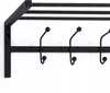 A close-up, studio shot of a black metal coat rack mounted on a white wall. Produktbild-Vorschau