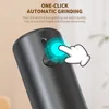 Close-up of an electric grinder with a cartoon hand pointing to the button. Náhľad obrázku produktu