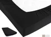 A black fitted sheet is shown on a mattress, with a smaller folded sheet in the foreground. Produktbild-Vorschau
