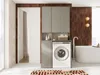 A modern laundry room with a washing machine, cabinets, and a bathtub. Produktbild-Vorschau