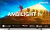 A television screen displaying a marketing image with hikers on a mountain and text overlays. Produktbild-Vorschau