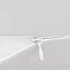 A close-up view of a zipper on a gray fabric product. Produktbild-Vorschau