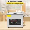 A VEVOR 6L ultrasonic cleaner is shown in a retail or laboratory setting, with shelves of products in the background. Náhled obrázku produktu