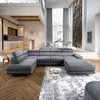 A spacious, modern living room with a large sectional sofa, dining area, and kitchen visible. Produktbild-Vorschau