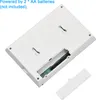 The back of a white digital thermostat is shown with the battery compartment open and the cover beside it. Podgląd zdjęcia produktu