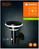 Product packaging with a promotional image of a solar wall light and its features. Anteprima dell’immagine prodotto