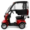 A red three-wheeled electric scooter with a black roof and enclosure, shown from the side against a white background. Produktbild-Vorschau