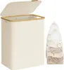 A cream-colored laundry basket with a bamboo rim and lid, shown open, next to two laundry bags filled with clothes. Náhled obrázku produktu
