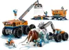 A collection of LEGO City Arctic exploration vehicles and figures, including a large mobile research station, a smaller vehicle with a saw, a snowmobile, and a mammoth frozen in ice. Náhled obrázku produktu