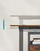A side view of a standing desk with two levels, showing its adjustable height feature. Náhled obrázku produktu