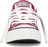 A close-up front view of a red Converse Chuck Taylor All Star sneaker with white laces. Voir les images du produit
