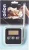The product is packaged in a clear plastic blister pack, showing a digital kitchen thermometer with a probe. The background of the packaging features an image of roasted meat being tested with a thermometer in an oven. Náhľad obrázku produktu