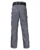 The back view of a pair of gray work pants with a black belt. Produktbild-Vorschau