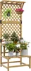 A wooden plant stand with multiple tiers and a trellis back, adorned with various potted plants and hanging baskets. Produktbild-Vorschau