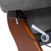 A close-up view of the underside of a recliner chair, showing the mechanical lever and cable mechanism. Produktbild-Vorschau