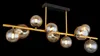 A modern chandelier with multiple glass globes and a black rectangular base. Náhled obrázku produktu