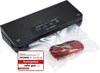 A black vacuum sealer machine with a piece of meat in a vacuum bag. Produktbild-Vorschau