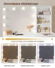 A white vanity table with a lighted mirror and shelves filled with cosmetics and accessories. Below the main image are three smaller images showing different light settings: warm, natural, and cool. Voir les images du produit