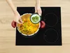 A person is adding ingredients to a pressure cooker on an induction stove. Produktbild-Vorschau
