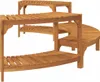 A wooden tiered plant stand with curved shelves. Produktbild-Vorschau