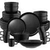 A collection of black ceramic dinnerware, including plates, bowls, and cups, neatly stacked. Náhled obrázku produktu