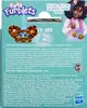 The back of a Furby Furblets toy packaging, showing the product, a character illustration, and extensive product information in multiple languages. Podgląd zdjęcia produktu