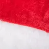 A close-up view of the trim of a Santa hat, showing the red fabric and white faux fur. Anteprima dell’immagine prodotto