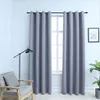 A room interior with a window covered by gray curtains, a chair, and a floor lamp. Náhled obrázku produktu