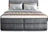 A bed with pillows and blankets, presented on a white background. Produktbild-Vorschau