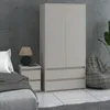A bedroom scene with a nightstand, wardrobe, and beanbag chair. Náhľad obrázku produktu