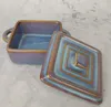 A square ceramic baking dish with a lid, shown from a slightly elevated angle. Náhled obrázku produktu