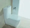 A white toilet in a bathroom setting with tiled walls and floor. Produktbild-Vorschau