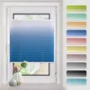 A pleated blind with a blue and white gradient is shown in a window, with decorative vases and flowers on the windowsill below. A strip of color swatches is visible on the right side of the image. Produktbild-Vorschau