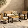 An outdoor furniture set arranged on a patio. Produktbild-Vorschau