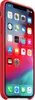 A red iPhone Xs Max in a red silicone case, displaying the home screen with various app icons. Anteprima dell’immagine prodotto